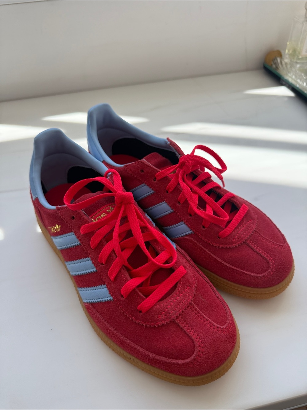 Women’s Red Adidas Spezial Sneakers with Light Blue Stripes